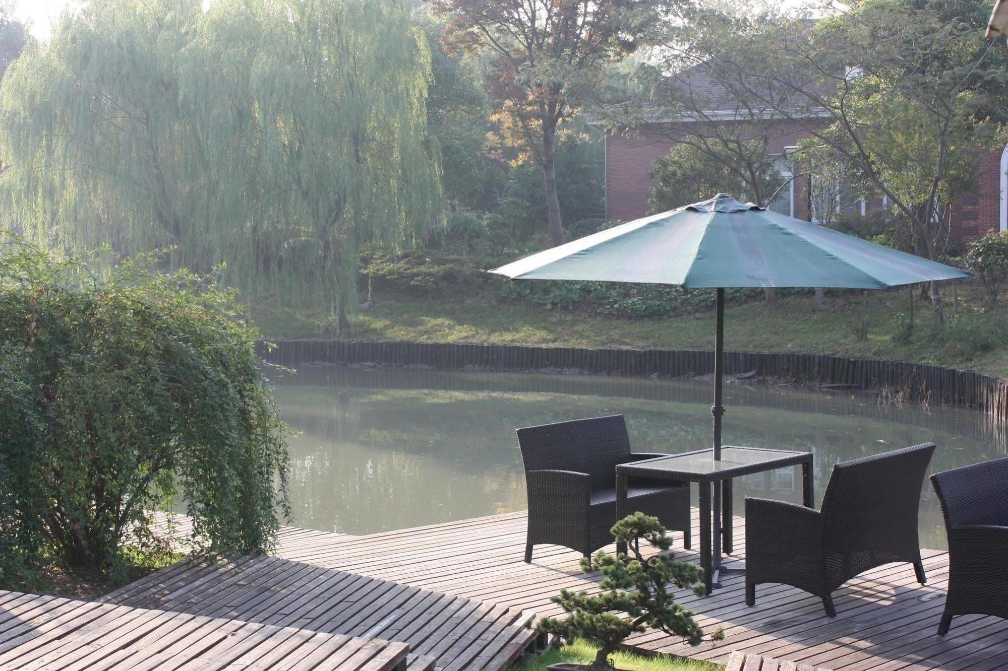 Baolong Garden Hotel 5*